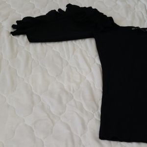 Black top, designer arms
